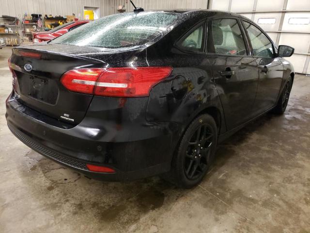 Photo 4 from auction – 2016 FORD FOCUS SE with VIN 1FADP3F27GL313052
