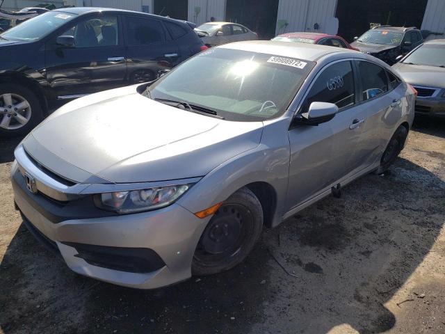 Photo 2 from auction – 2018 HONDA CIVIC LX with VIN 19XFC2F57JE012154