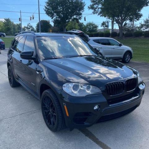 BMW X5 XDRIVE5 2013 with VIN 5UXZV8C55D0C16822 - Photo from auction