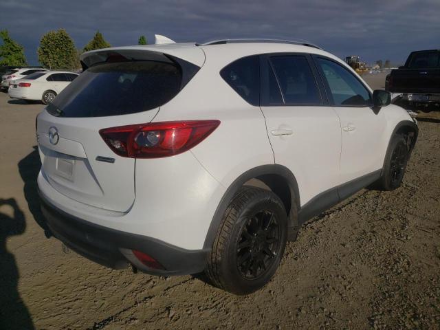 Photo 4 from auction – 2016 MAZDA CX-5 GT with VIN JM3KE4DYXG0785937