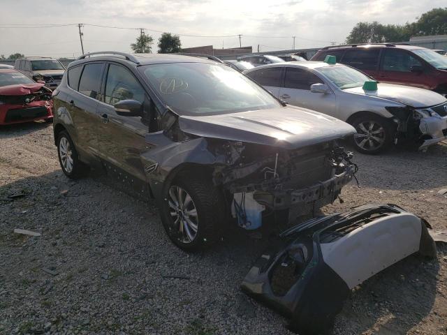 FORD ESCAPE TIT 2018 with VIN 1FMCU9J98JUB55713 - Photo from auction