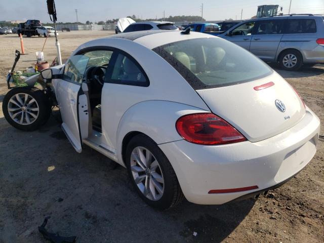 Photo 3 from auction – 2014 VOLKSWAGEN BEETLE with VIN 3VWJP7AT0EM628689