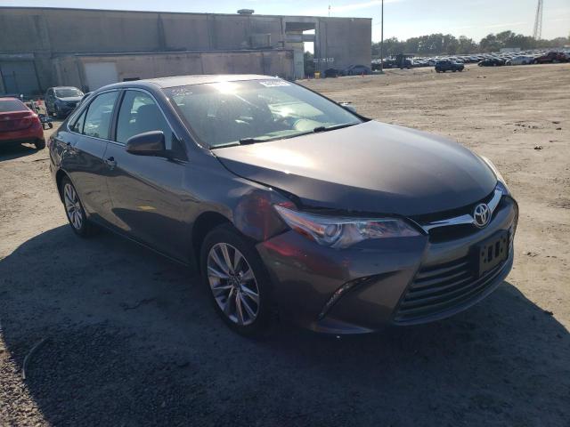 TOYOTA CAMRY LE 2017 with VIN 4T1BF1FK0HU785464 - Photo from auction