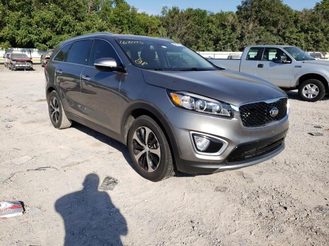 KIA SORENTO EX 2016 with VIN 5XYPH4A58GG163475 - Photo from auction
