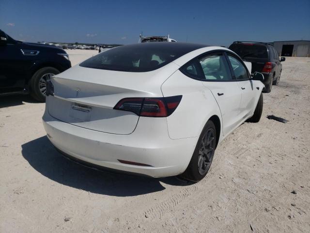 Photo 4 from auction – 2021 TESLA MODEL 3 with VIN 5YJ3E1EA2MF095397