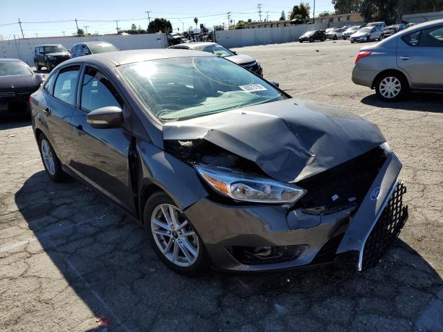 FORD FOCUS SE 2016 with VIN 1FADP3F21GL231043 - Photo from auction