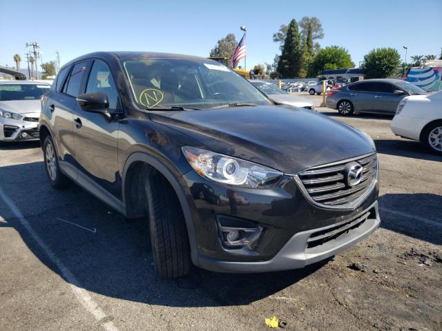 MAZDA CX-5 TOURI 2016 with VIN JM3KE2CY9G0847026 - Photo from auction