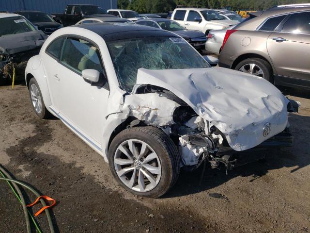 VOLKSWAGEN BEETLE 2014 with VIN 3VWJP7AT0EM628689 - Photo from auction