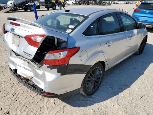 Photo 4 from auction – 2014 FORD FOCUS TITA with VIN 1FADP3J23EL320357
