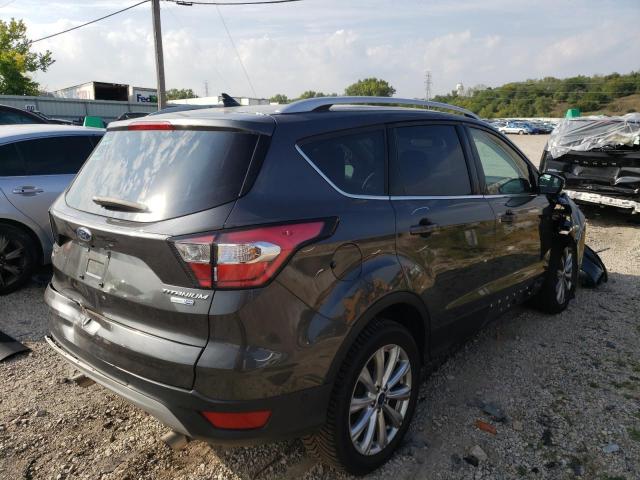 Photo 4 from auction – 2018 FORD ESCAPE TIT with VIN 1FMCU9J98JUB55713