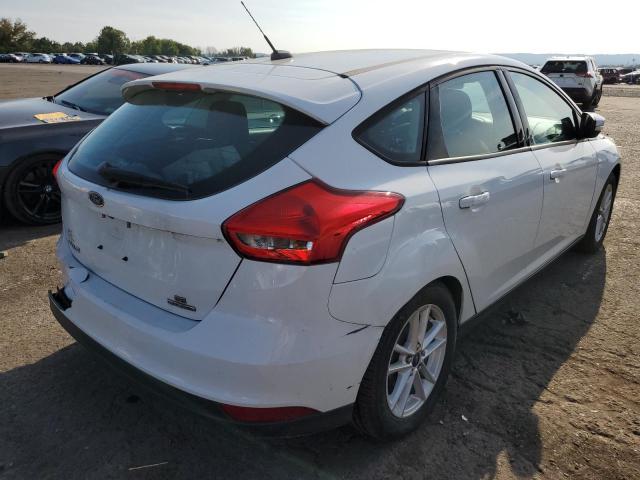 Photo 4 from auction – 2015 FORD FOCUS SE with VIN 1FADP3K29FL288952