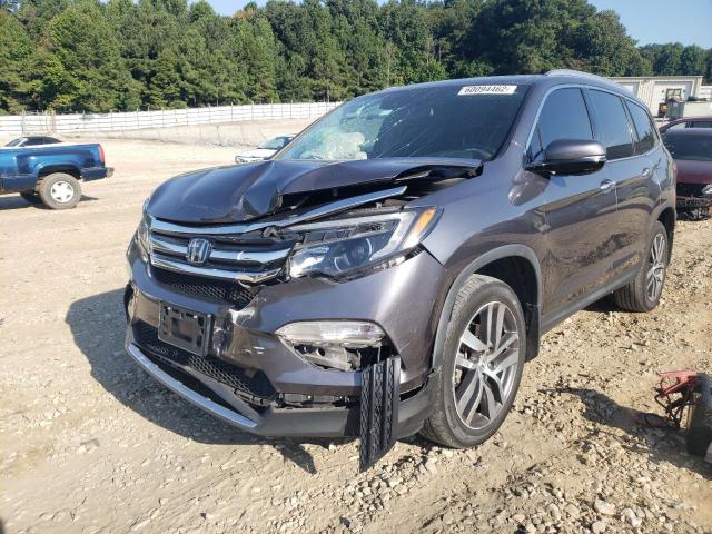 Photo 2 from auction – 2017 HONDA PILOT TOUR with VIN 5FNYF5H90HB013832
