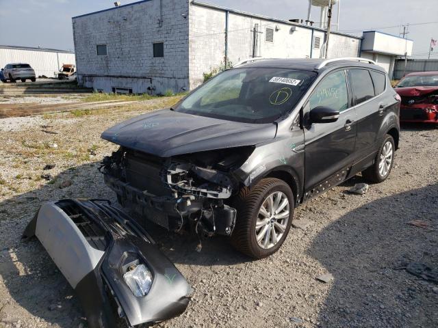 Photo 2 from auction – 2018 FORD ESCAPE TIT with VIN 1FMCU9J98JUB55713