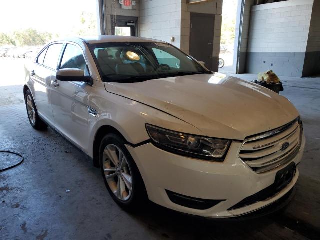 FORD TAURUS SEL 2016 with VIN 1FAHP2E8XGG121618 - Photo from auction