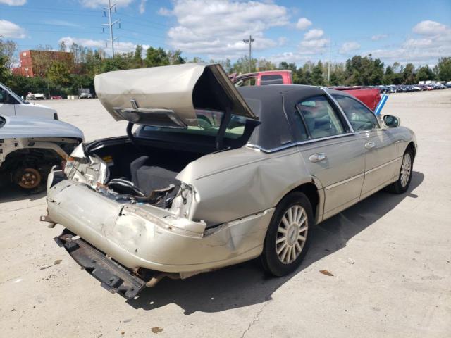 Photo 4 from auction – 2004 LINCOLN TOWN CAR E with VIN 1LNHM81W04Y663208