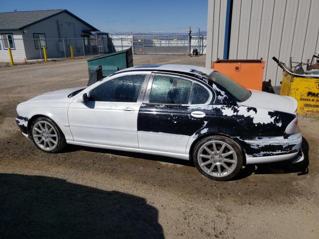 Photo 9 from auction – 2004 JAGUAR X-TYPE 3.0 with VIN SAJEB51C94WD87208