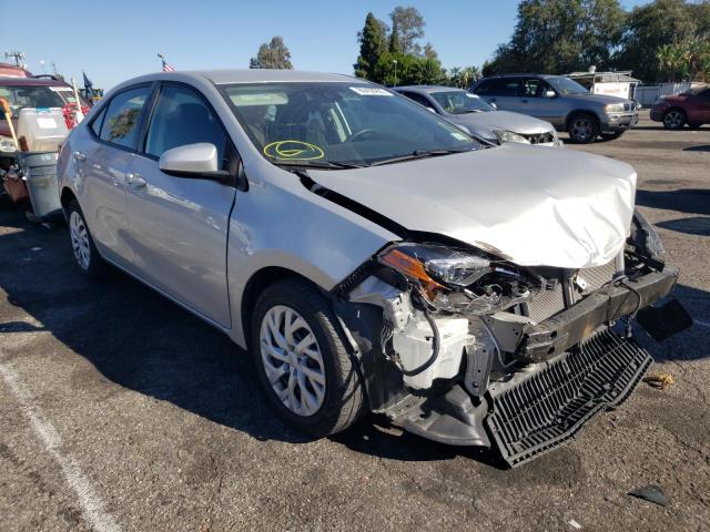 TOYOTA COROLLA L 2019 with VIN 5YFBURHE2KP912848 - Photo from auction