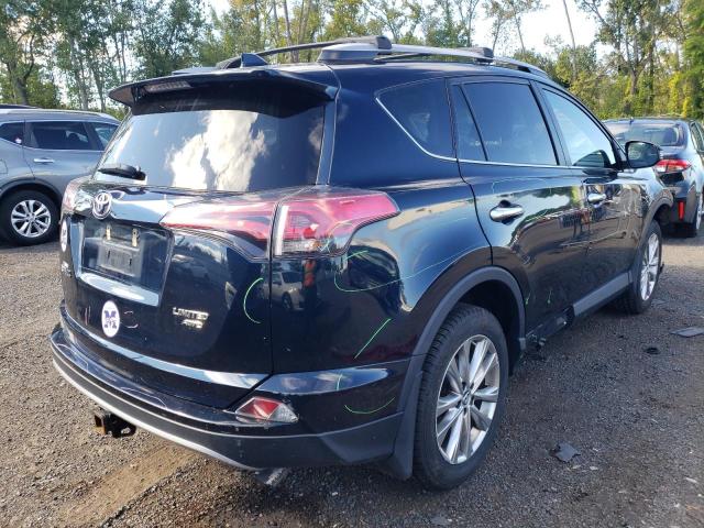 Photo 4 from auction – 2018 TOYOTA RAV4 LIMIT with VIN 2T3DFREV3JW722312