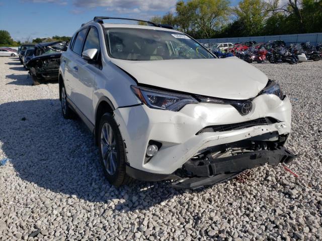 Photo 1 from auction – 2018 TOYOTA RAV4 LIMIT with VIN JTMDFREV5JJ249897