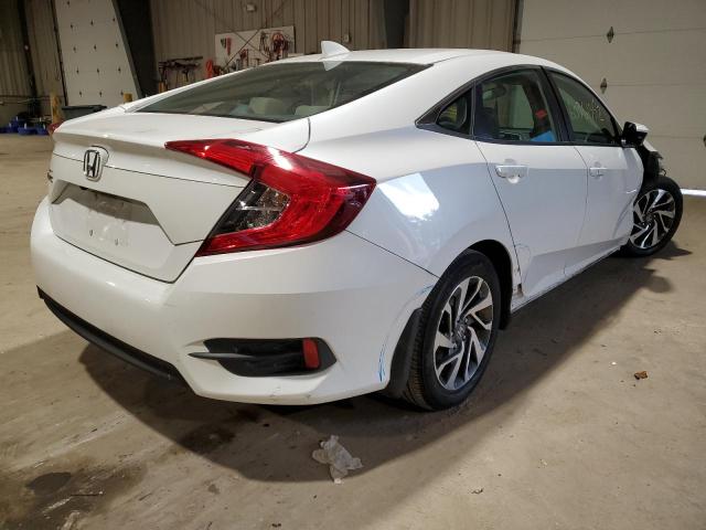 Photo 4 from auction – 2018 HONDA CIVIC EX with VIN 19XFC2F70JE208230