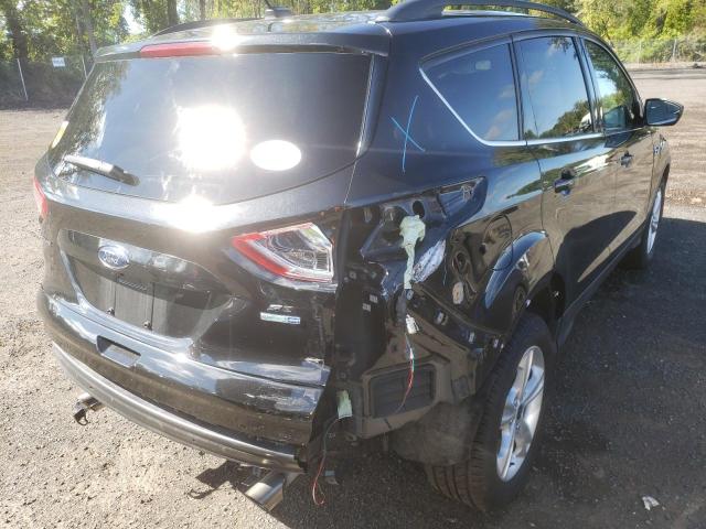 Photo 4 from auction – 2015 FORD ESCAPE SE with VIN 1FMCU9G93FUC72355
