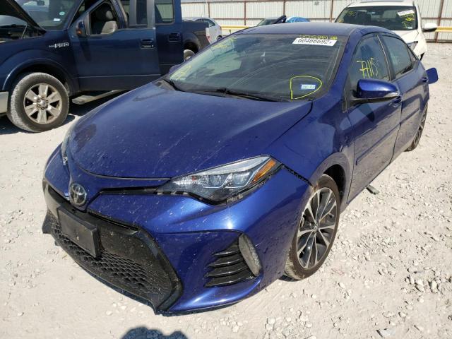 Photo 2 from auction – 2019 TOYOTA COROLLA L with VIN 5YFBURHE5KP875861