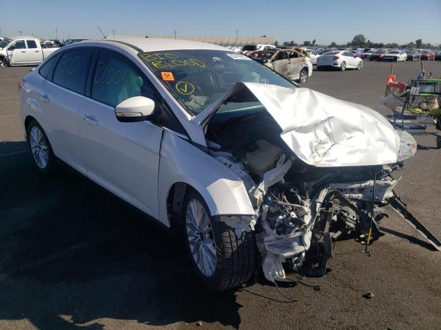 FORD FOCUS TITA 2015 with VIN 1FADP3J2XFL300611 - Photo from auction