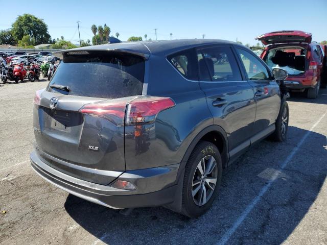 Photo 4 from auction – 2017 TOYOTA RAV4 XLE with VIN JTMWFREV0HD107328
