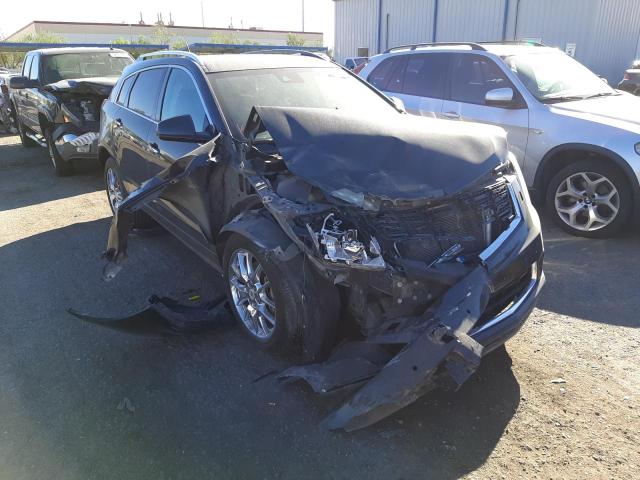 CADILLAC SRX PREMIU 2014 with VIN 3GYFNDE3XES585959 - Photo from auction