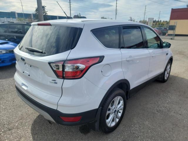 Photo 4 from auction – 2017 FORD ESCAPE SE with VIN 1FMCU9GD2HUB24785