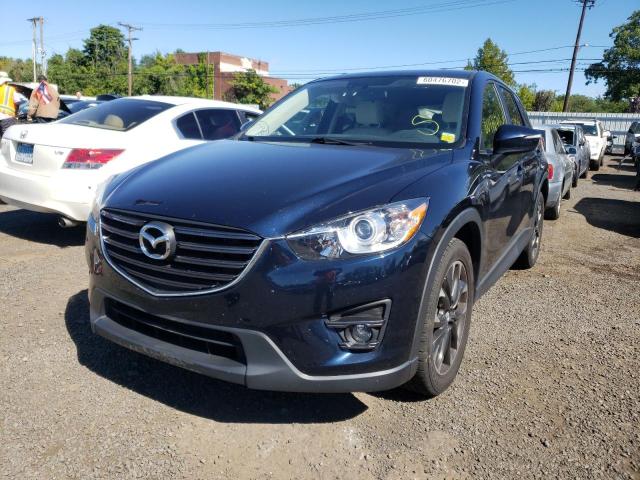Photo 2 from auction – 2016 MAZDA CX-5 GT with VIN JM3KE4DY6G0668551