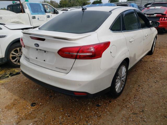 Photo 4 from auction – 2017 FORD FOCUS TITA with VIN 1FADP3J29HL342643