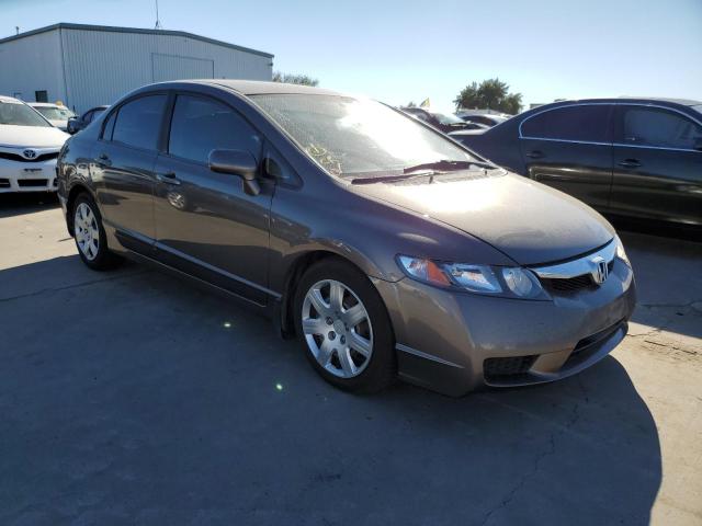 HONDA CIVIC LX 2011 with VIN 19XFA1F53BE048635 - Photo from auction