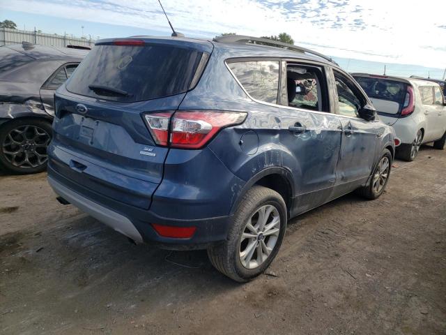 Photo 4 from auction – 2018 FORD ESCAPE SE with VIN 1FMCU0GD8JUB99640