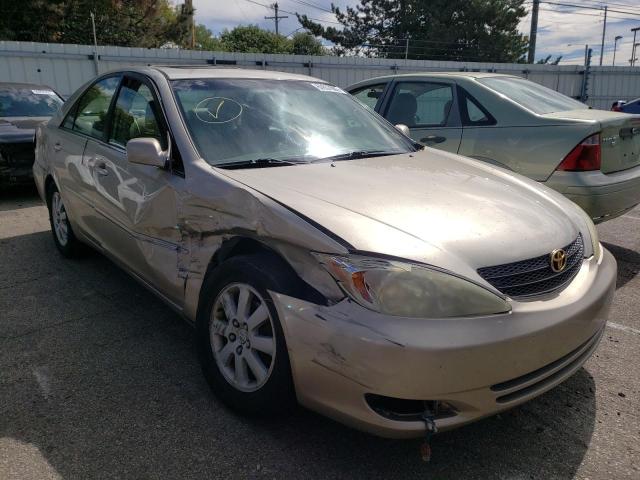 TOYOTA CAMRY LE 2004 with VIN 4T1BE30K74U289112 - Photo from auction