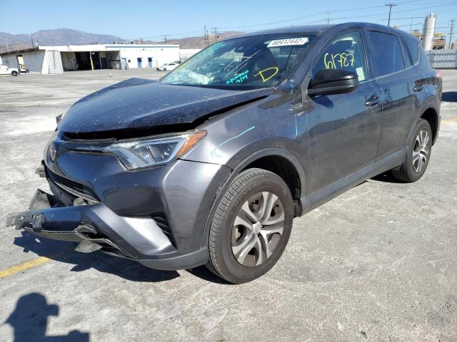 Photo 2 from auction – 2018 TOYOTA RAV4 LE with VIN JTMZFREV0JJ168456