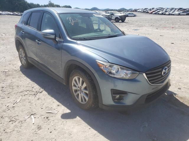 MAZDA CX-5 TOURI 2016 with VIN JM3KE4CY5G0665934 - Photo from auction