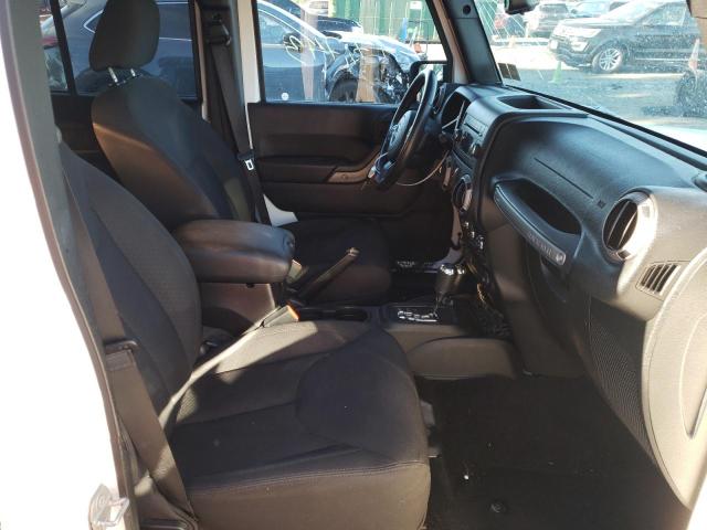 Photo 5 from auction – 2015 JEEP WRANGLER U with VIN 1C4BJWDG4FL744191