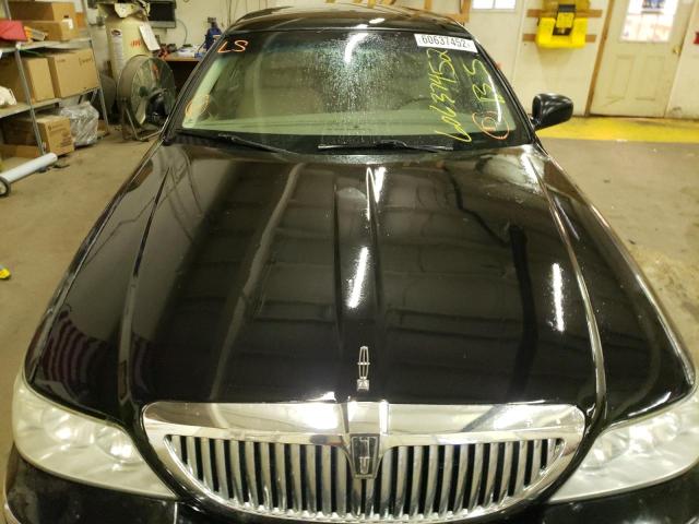 Photo 9 from auction – 2004 LINCOLN TOWN CAR E with VIN 1LNHM81W44Y623794