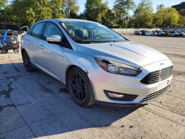 FORD FOCUS SE 2016 with VIN 1FADP3FE1GL371779 - Photo from auction