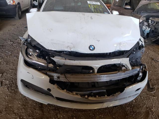 Photo 9 from auction – 2014 BMW 7 SERIES with VIN WBAYE8C58ED136433