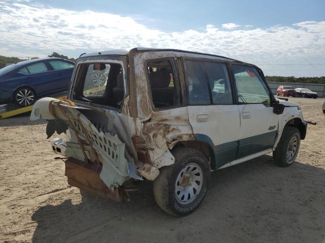 Фото 4 с аукциона – 1997 SUZUKI SIDEKICK S с VIN JS3TD21VXV4110093