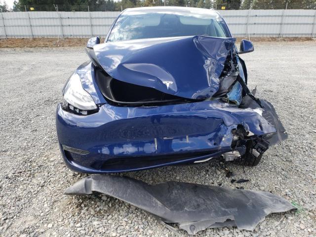 Photo 9 from auction – 2022 TESLA MODEL Y with VIN 7SAYGDEE3NF348610