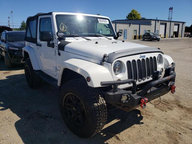 JEEP WRANGLER S 2015 with VIN 1C4AJWBG0FL768924 - Photo from auction
