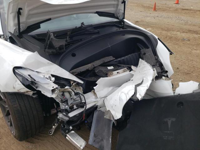 Photo 9 from auction – 2021 TESLA MODEL 3 with VIN 5YJ3E1EB7MF988254
