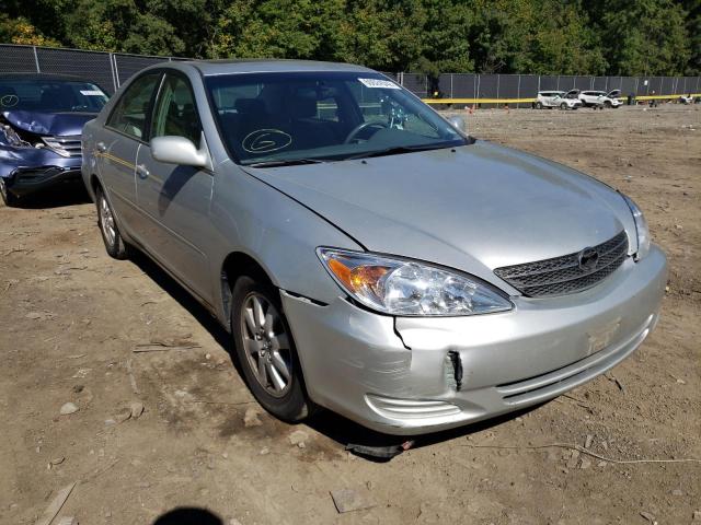 TOYOTA CAMRY LE 2002 with VIN 4T1BE30KX2U583634 - Photo from auction
