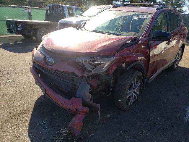Photo 9 from auction – 2018 TOYOTA RAV4 LE with VIN JTMBFREV2JD224848
