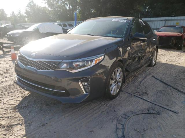 Photo 2 from auction – 2018 KIA OPTIMA LX with VIN 5XXGT4L37JG246787