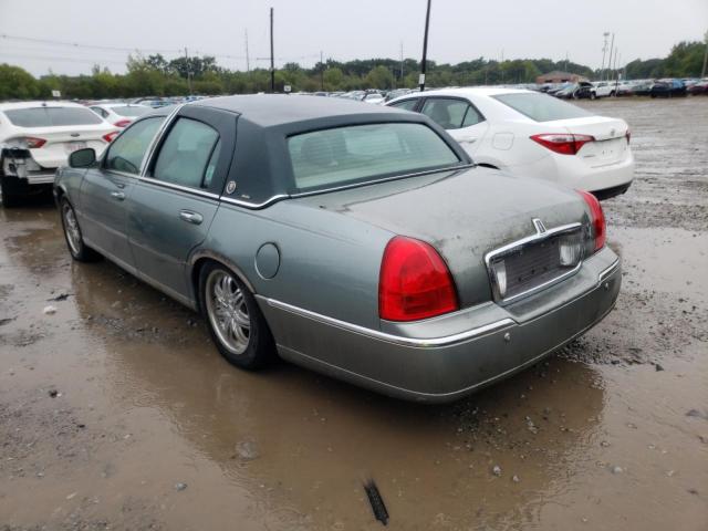 Photo 3 from auction – 2004 LINCOLN TOWN CAR with VIN 1LNHM83W74Y685641