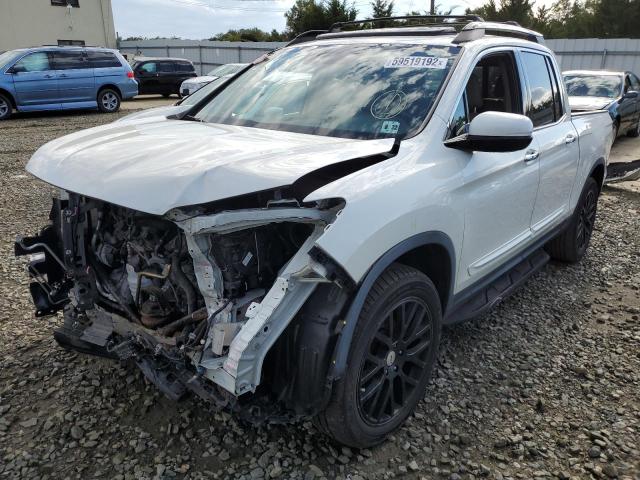 Photo 2 from auction – 2017 HONDA RIDGELINE with VIN 5FPYK3F76HB028439